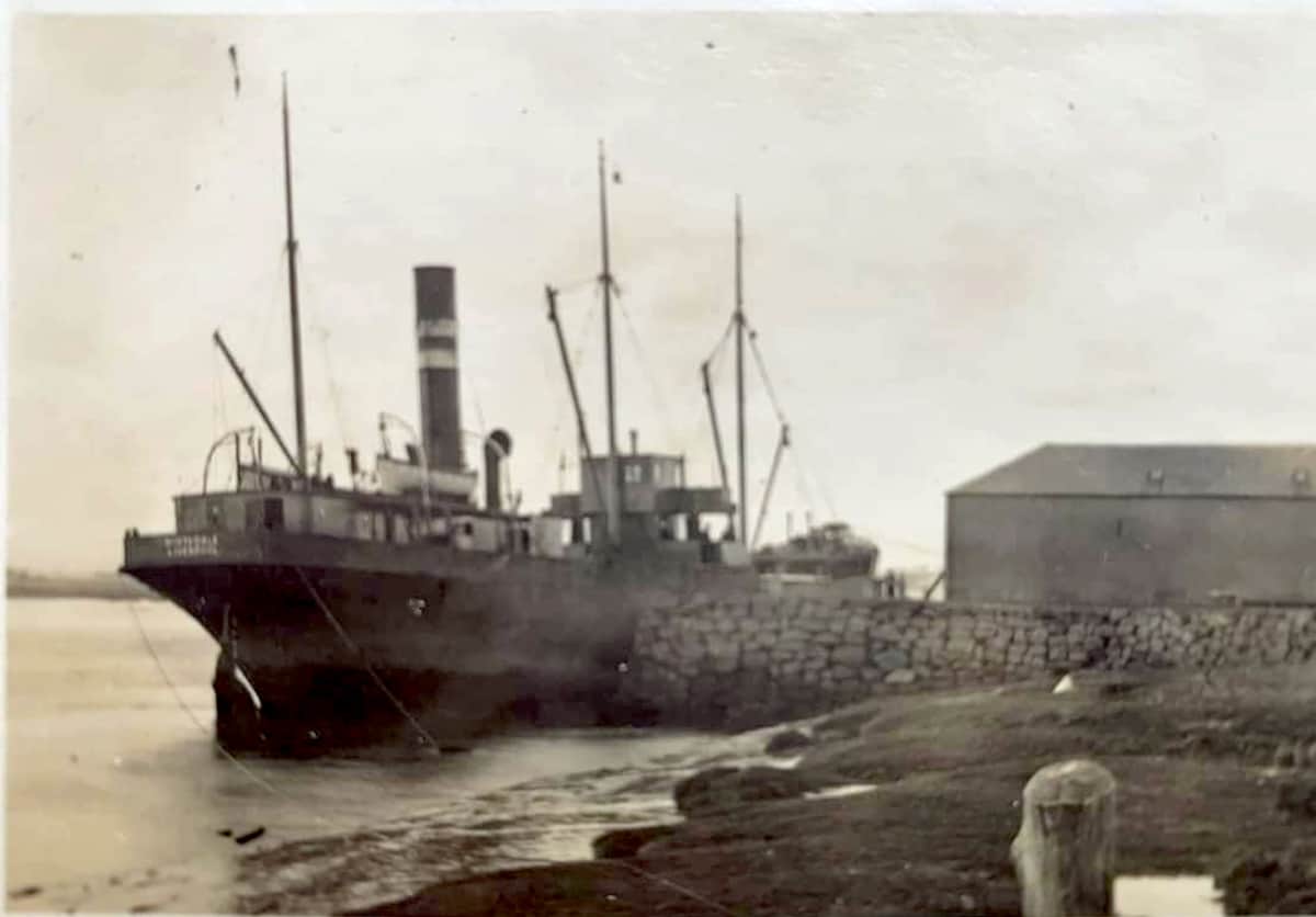 Black and white photo of Old steam packet ship berthed at Glencaple Quay 1920s